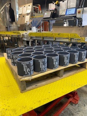 Couplings drying after being dipping into the Moly-Mist tank image